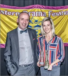  ??  ?? Brendan McGowan Chairman of the Western Drama Festival presents Sharon Hannon with the awards won by the Phoenix Players.