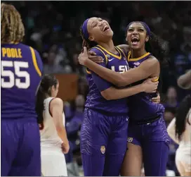  ?? TONY GUTIERREZ — THE ASSOCIATED PRESS ?? LSU’s Angel Reese and LaDazhia Williams react during the second half of a Final Four semifinals game against Virginia Tech on Friday in Dallas.