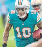  ?? JIM RASSOL/STAFF FILE PHOTO ?? The Dolphins managed to keep wide receiver Kenny Stills and his touchdown potential in the offseason. Otherwise they would need to look to the draft for a receiver.