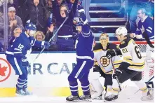  ?? FRANK GUNN/THE CANADIAN PRESS VIA AP ?? Toronto center Patrick Marleau (12) celebrates after scoring a goal during the Maple Leafs’ win over the Bruins in Game 3 Monday.