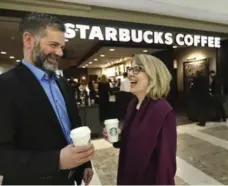  ?? RICHARD LAUTENS/TORONTO STAR ?? Luisa Girotto of Starbucks Canada said the company worked with Hire Immigrants on a plan to hire 1,000 refugees. Mark Patterson, Hire Immigrants executive director, said he wasn’t surprised by the offer.