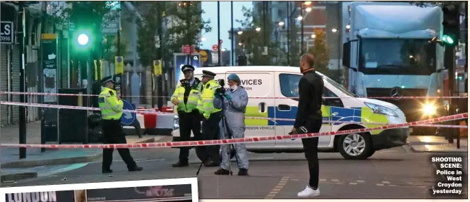  ??  ?? SHOOTING SCENE: Police in West Croydon yesterday