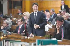  ?? CP PHOTO ?? Prime Minister Justin Trudeau rises to vote during a marathon voting session in the House of Commons on Parliament Hill on Friday.