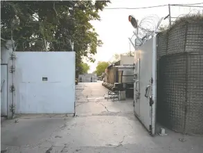  ?? WAKIL KOHSAR / AFP VIA GETTY IMAGES ?? The entrance gate of the Canadian Embassy compound after the evacuation of Kabul in
August 2021. The Taliban were prepared to overwhelm Afghanista­n's capital city.