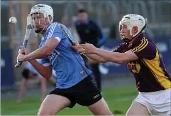  ??  ?? Wexford attacker Cathal Dunbar applies heavy pressure on Dublin’s John Bellew.