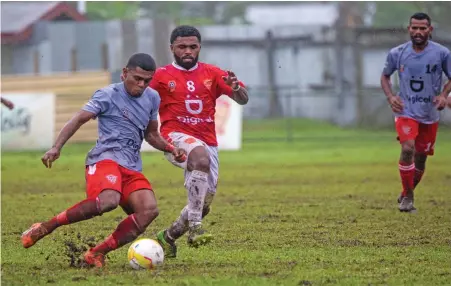  ?? Photo: ?? Rewa captain and striker Setareki Hughes (8) goes in for the challenge against Labasa during the Digicel Fiji Premier League clash at Ratu Cakobau Park, Nausori, on May 14, 2023.