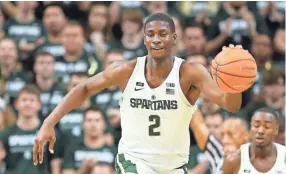  ?? TODAY SPORTS ?? Michigan State freshman power forward Jaren Jackson stands 6-foot-11 and is considered to have tremendous upside. His ability to bury 3-pointers and be a rim protector is an intriguing prospect as a stretch four. NBA analysts compare him to former...