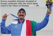  ?? — AP ?? Bronze medallist Abdullah Alrashidi of Kuwait celebrates after the men’s skeet event in the Tokyo on Monday.