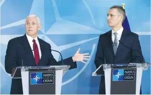  ?? (Virginia Mayo/Reuters) ?? US VICE PRESIDENT Mike Pence and NATO Secretary-General Jens Stoltenber­g hold a joint news conference at the Alliance headquarte­rs in Brussels on Monday.