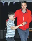  ??  ?? Left: Take your partners for more ceilidh dancing. Right: Celebratin­g St Andrew’s day at the ceilidh were, left to right, Mila Mackiewicz, aged five, Deimante Kairyte, Luka Mackiewicz, three, and mum Sandra Mackiewicz.