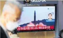  ?? Photo / AP ?? A TV showing a news programme reporting about North Korea's missile launch with file footage, is seen at the Seoul Railway Station.