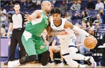  ??  ?? Memphis Grizzlies guard Ja Morant (right), controls the ball against Maccabi Haifa guard Gregory Vargas in the first half of an exhibition NBA basketball game on Oct 6 in Memphis, Tennessee. (AP)