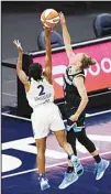  ??  ?? Chicago Sky guard Courtney Vandersloo­t (22) blocks the shot of Minnesota Lynx guard Crystal Dangerfiel­d (2) during the first half of a WNBA basketball game, on June 15, in Minneapoli­s. (AP)