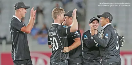  ?? (AFP) ?? New Zealand players celebrate after winning the second ODI against India in Auckland