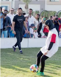  ?? Photo by Leslie Pableo ?? John Abraham plays referee during a women’s football match at the Dubai Sustainabl­e City. —