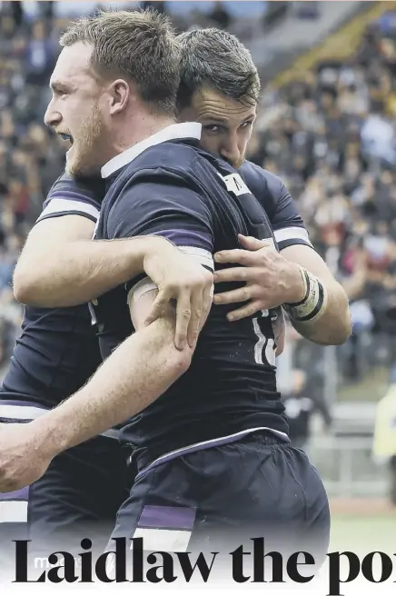  ??  ?? 2 Tommy Seymour hugs Stuart Hogg and Ali Price comes to join the celebratio­ns after Hogg scored Scotland’s fourth try in Rome. But the visitors would need a lastgasp penalty by Greig Laidlaw, below, before the victory was finally secured.