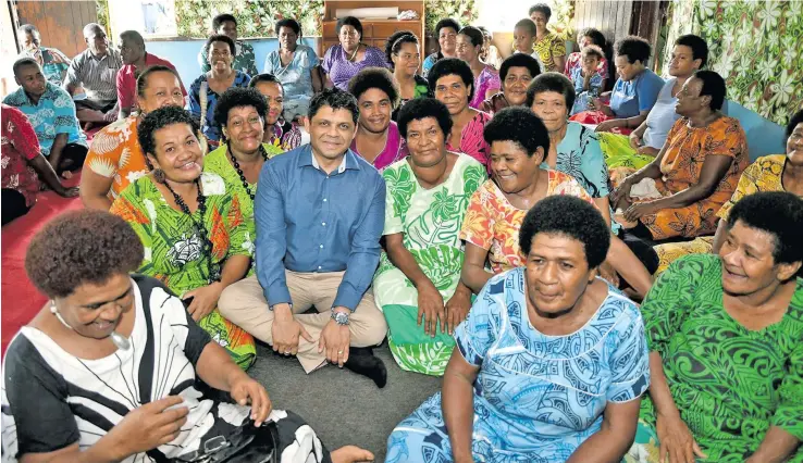  ?? Photo: DEPTFO News ?? Attorney-General Aiyaz Sayed-Khaiyum with women from Korobebe Village.