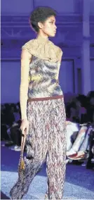  ?? Photos by Valerio Mezzanotti / New York Times ?? A model at the Missoni show.