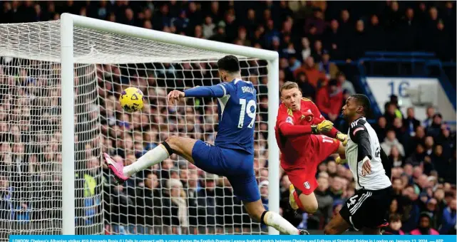  ?? AFP ?? LONDON: Chelsea’s Albanian striker #19 Armando Broja (L) fails to connect with a cross during the English Premier League football match between Chelsea and Fulham at Stamford Bridge in London on January 13, 2024. —