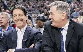  ?? THE CANADIAN PRESS/ CHRIS YOUNG ?? The Maple Leafs’ new president, Brendan Shanahan, left, sits with CEO Tim Leiweke as they watch the Toronto Raptors on Monday. Earlier, he said he was humbled by the task ahead.
