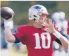  ?? STEVEN SENNE/AP ?? The Patriots’ Mac Jones leads all rookie quarterbac­ks in passing yards (1,472), completion percentage (71.1) and rating (89.6).