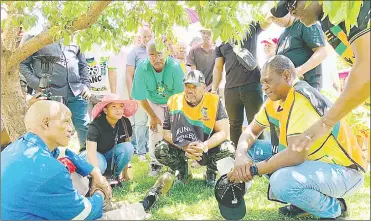  ?? (Pic: @PMashatile) ?? ANC Treasurer General Paul Mashatile (2nd R) addressing volunteers during the party’s Letsema campaign in Ditsobotla Municipali­ty.