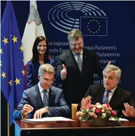  ??  ?? Home Affairs Minister Carmelo Abela, MEP Mariya Gabriel, Ukrainian President Petro Poroshenko, and EU Parliament President Antonio Tajani at the signing of the EU regulation granting Ukraine’s citizens visa-free travel last week.