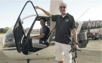  ?? GROUP 3 AVIATION VIA AP ?? Helicopter pilot Ara Zobayan stands outside a helicopter in an undated photo.