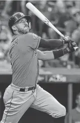  ?? Karen Warren / Staff photograph­er ?? The Astros were encouraged with the way shortstop Carlos Correa took a pitch from Indians reliever Brad Hand to the opposite field for a three-run homer during the eighth inning Monday. It was Correa’s only hit of the series in 13 plate appearance­s.