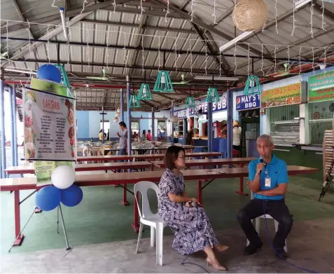  ??  ?? Larsian manager Joey Herrera assures stringent penalties will be meted against erring stall owners and employees as the famous food strip in uptown Cebu City formally opens yesterday after a three-month rehabilita­tion. MAY B. MIASCO