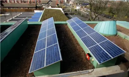  ?? Photograph: Trevor Smith/Alamy ?? Solar panels on the roof of a school building in Liverpool. ‘A “smart, activist state” is required to decarbonis­e and make energy-efficient the UK’s 30m buildings.’