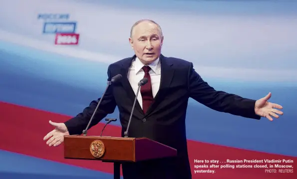  ?? ?? Here to stay . . . Russian President Vladimir Putin speaks after polling stations closed, in Moscow, yesterday.