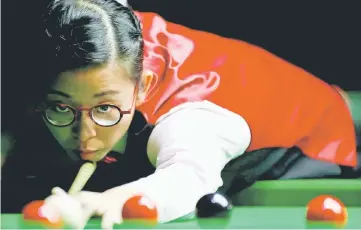  ??  ?? Ng On Yee of Hong Kong plays a shot during her semi-final match against Reanne Evans of England during the Eden World Women’s Snooker Championsh­ip in Singapore, in this March 19 file photo. — Reuters photo