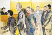  ?? ELIZABETH WILLIAMS VIA ASSOCIATED PRESS ?? In this courtroom drawing, Joaquin “El Chapo” Guzman, center, appears in a New York courtroom on Friday, after being extradited by Mexico to face drug charges.