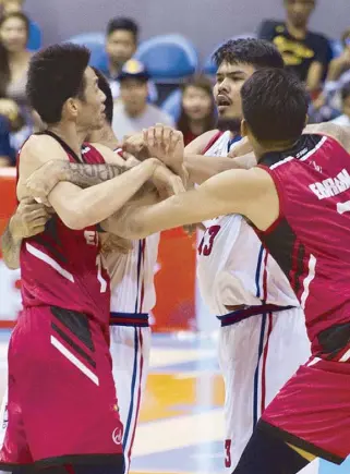  ?? MIGUEL DE GUZMAN ?? Blackwater’s Allein Maliksi (left) is held back by teammate John Paul Erram as he confronts Columbian Dyip’s Eric Camson during their PBA Commission­er’s Cup duel at the Smart Araneta Coliseum last Sunday. Columbian Dyip won, 126-98.