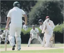  ??  ?? Mark Marwood fends off the Ryhope bowling in his side’s win.