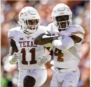  ?? JAY JANNER / AMERICAN-STATESMAN ?? UT junior safety DeShon Elliott (right) led the Longhorns with six intercepti­ons, returning two for touchdowns, and nearly became the school’s second Thorpe Award winner.