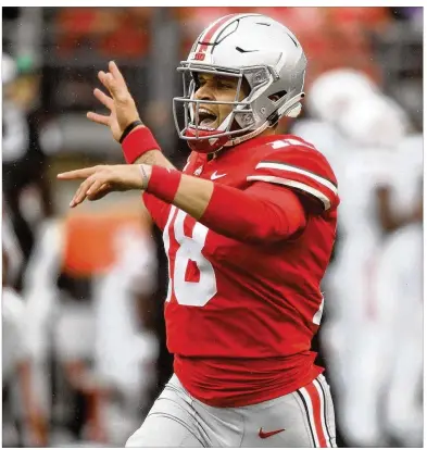  ?? DAVID JABLONSKI / STAFF 2018 ?? Ohio State’s Tate Martell celebrates after throwing a touchdown pass against Rutgers in September at Ohio Stadium in Columbus.