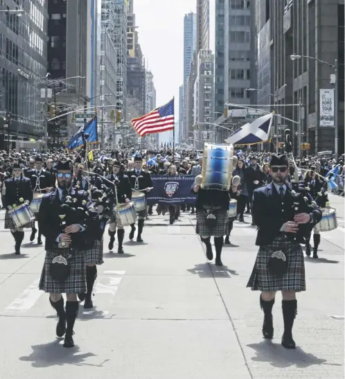  ?? ?? Bagpipers march along Sixth Avenue during a previous Tartan Day Parade in New York.