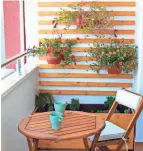  ?? ?? Appropriat­ely sized, weather-resistant furniture will complement your balcony’s dimensions and style.