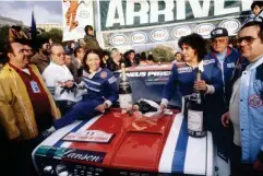  ??  ?? Celebratin­g with her team after finishing the Tour de Corse with a Fiat 131 Abarth in 1980 (AFP/Getty)