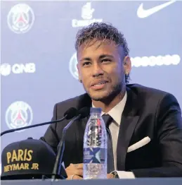  ??  ?? TOP PRICE: Neymar speaks during a press conference in Paris yesterday after he became the most expensive player in soccer history.