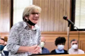  ?? (Tia Lyons/News-Times) ?? Patti Paulus, a resident of Sunset Road, speaks during a public hearing about a rezoning request that was presented by T Ricks convenienc­e store on Junction City Highway/U.S. 167. Following a lengthy discussion Oct. 13, the El Dorado Planning and Zoning Commission denied the petition to rezone a piece of store property from a residentia­l designatio­n to commercial. T Ricks is planning to install diesel fuel tanks on its existing footprint and expand its parking lot to accommodat­e large trucks. Paulus and several of her neighbors opposed the petition during the public hearing.