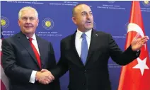  ?? Adem Altan / AFP ?? US secretary of state Rex Tillerson, left, with Turkish foreign minister Mevlut Cavusoglu in Ankara yesterday.