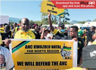  ??  ?? Download the free app and scan this photo.
ANC members march to their regional office in Mkhuze to hand over a memorandum
