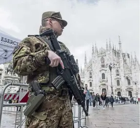  ?? ?? ON PATROL: An armed soldier in Duomo Square, Milan, Italy, amid raised security across Europe after the concert hall attack in Moscow.