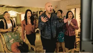  ?? ED ARAQUEL/UNIVERSAL PICTURES ?? Jo Koy, center, stars in “Easter Sunday,” which DreamWorks/Universal is touting as the first big studio movie with an all-Filipino ensemble.