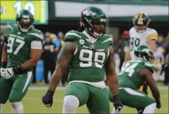  ?? SETH WENIG - THE ASSOCIATED PRESS ?? FILE - In this Dec. 22, 2019, file photo, New York Jets nose tackle Steve McLendon (99) celebrates in the second half of an NFL football game against the Pittsburgh Steelers, in East Rutherford, N.J.