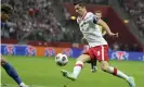  ??  ?? Lewandowsk­i attempts to create an opening for Poland during their draw against England. Photograph: Czarek