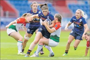  ??  ?? Former Lochaber player Helen Nelson on the charge in the first round of the recent Rugby Europe Trophy.